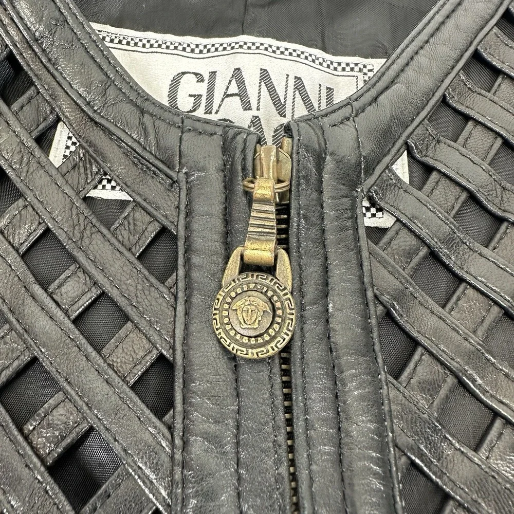 GIANNI VERSACE black leather vest w/ an open lattice feature in front 46